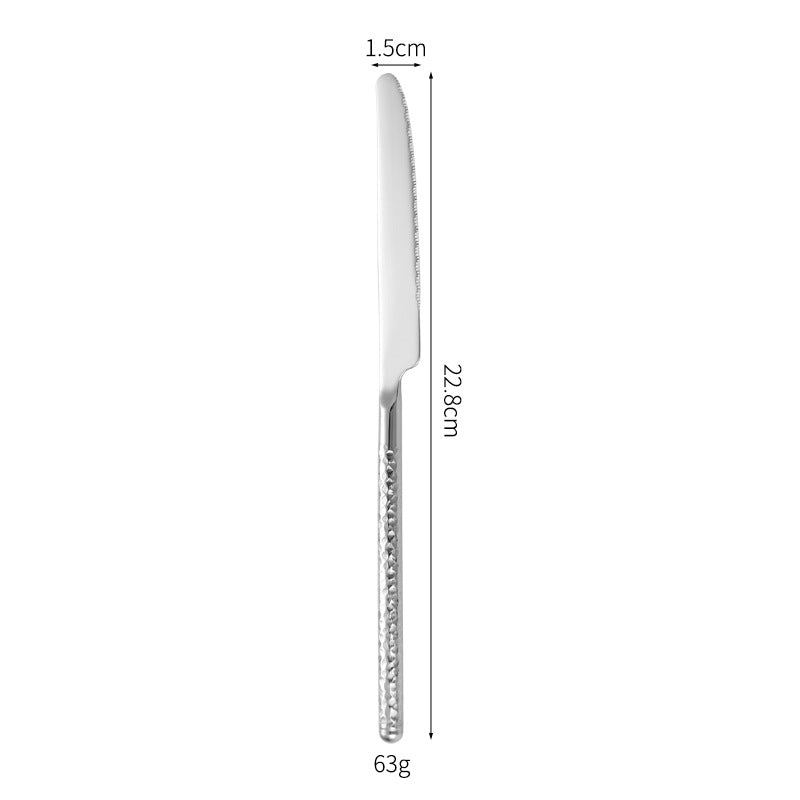 Elegant dessert spoon with elaborate handle design Stornfield