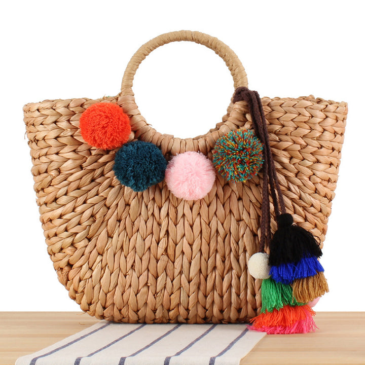 Basket bag with colorful pompons and carrying straps Stornfield