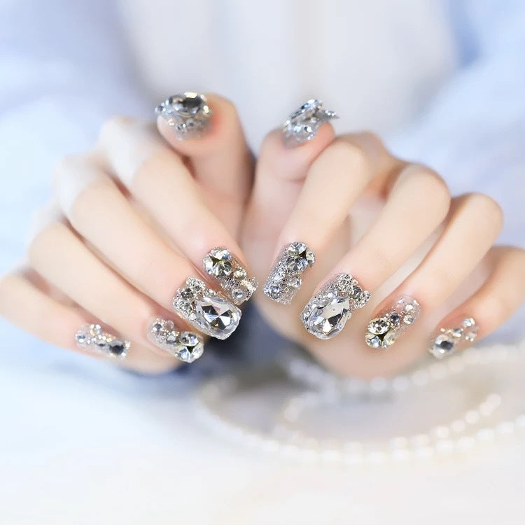 Nail art with glamorous rhinestone and glitter design Stornfield