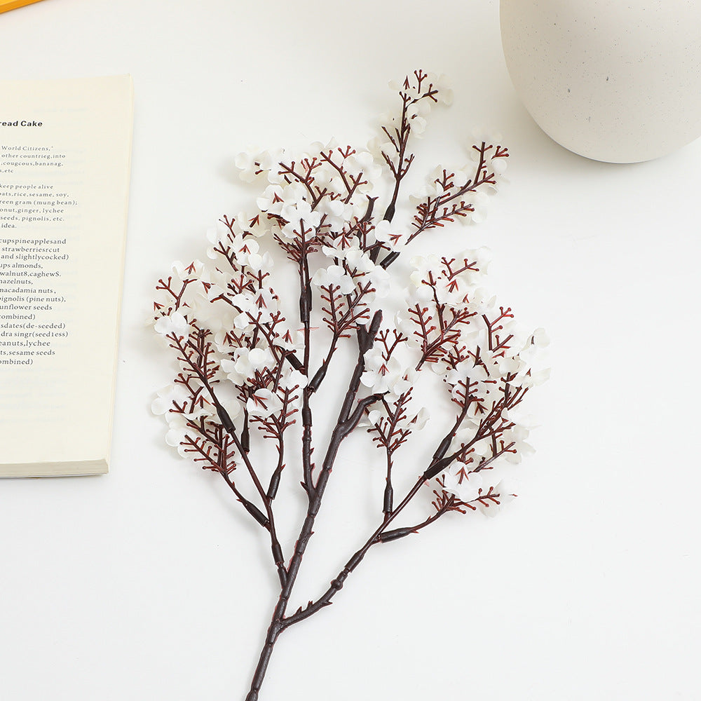 Decorative artificial flower branch