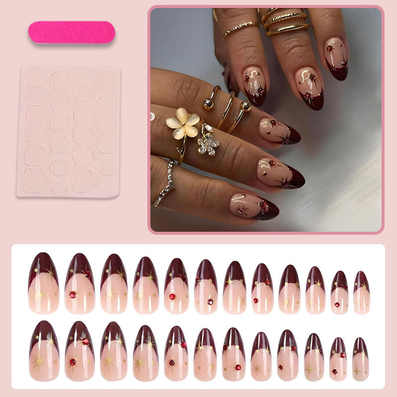 Acrylic nail set with glamorous embellishments and elegant accents Stornfield