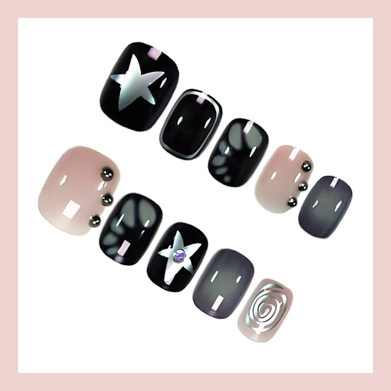Artificial nail set with creative star and glitter designs Stornfield