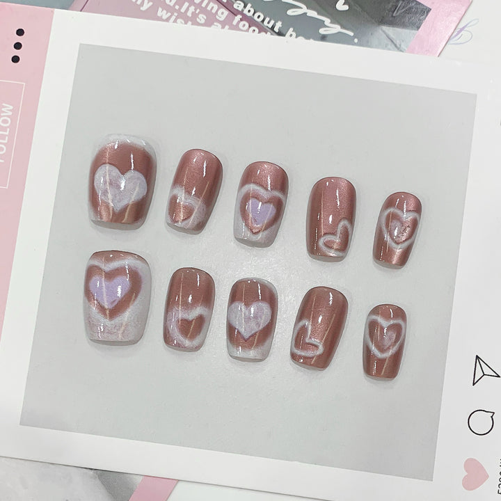 Artificial nail tips in heart design Stornfield