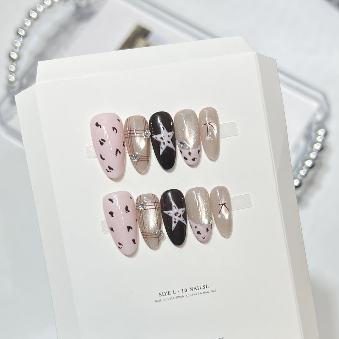 Artistic Press-On Nail Set with Star Patterns