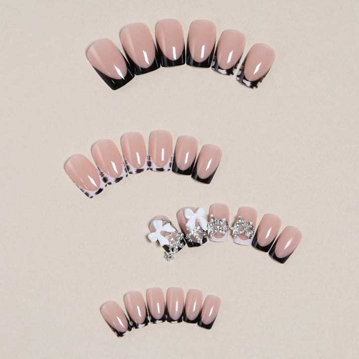 Elegant artificial nails with detailed embellishments Stornfield