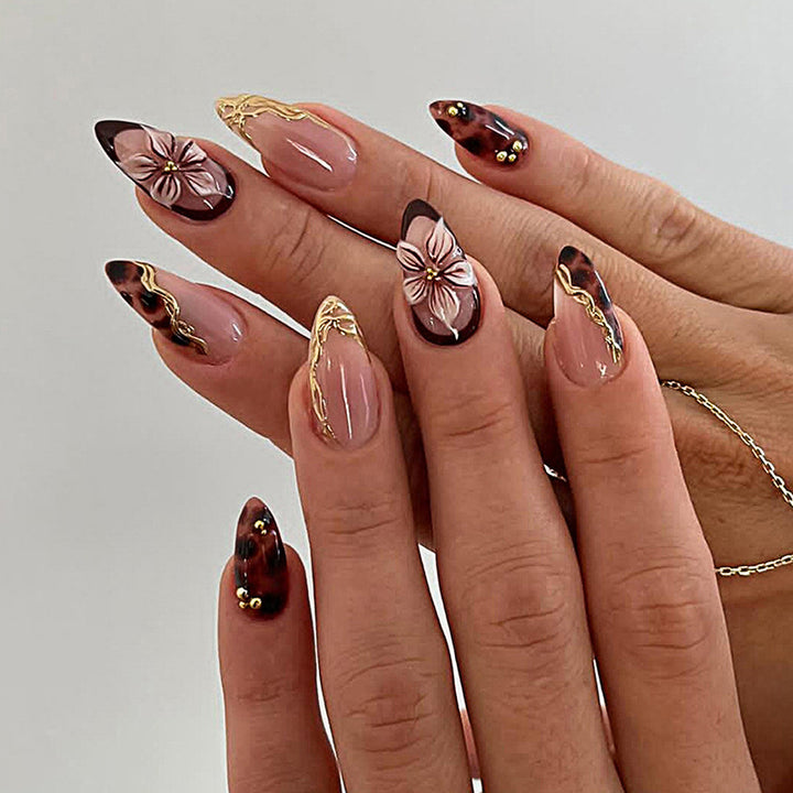 Artistic Press-On Nail Set with Elegant Floral and Abstract Designs Stornfield