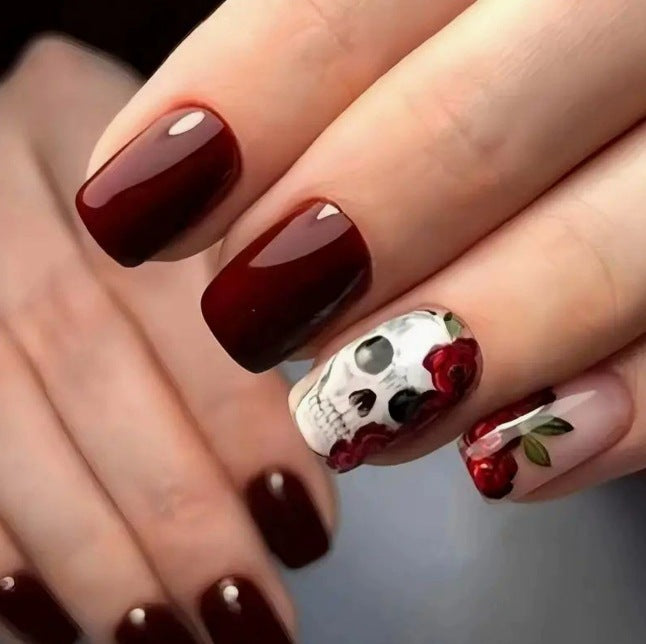 Artistic Skull-Themed Nail Art Stornfield