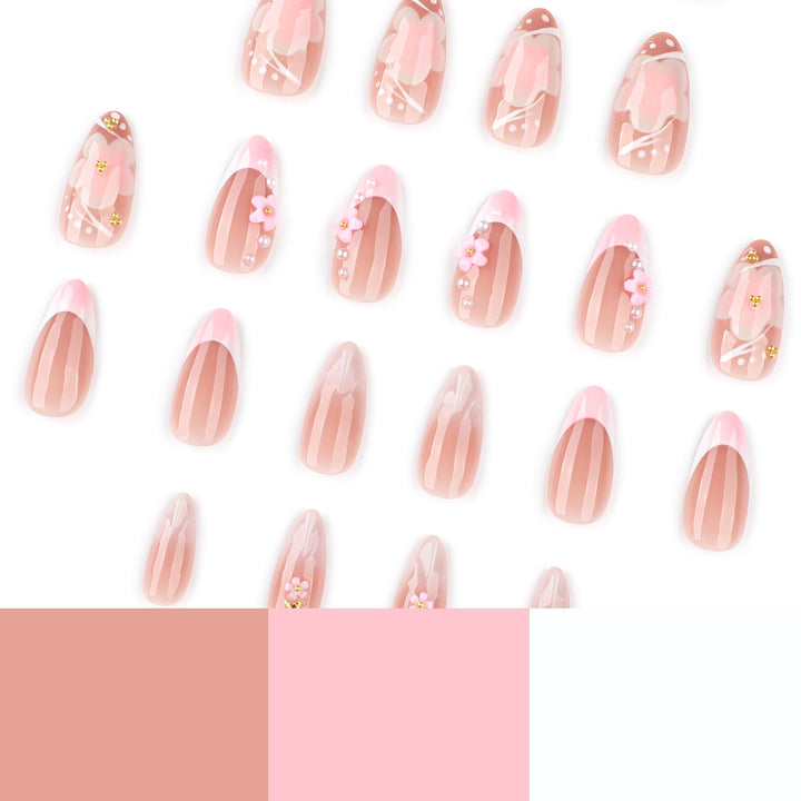 Artful nail extensions with floral patterns and glitter accents Stornfield