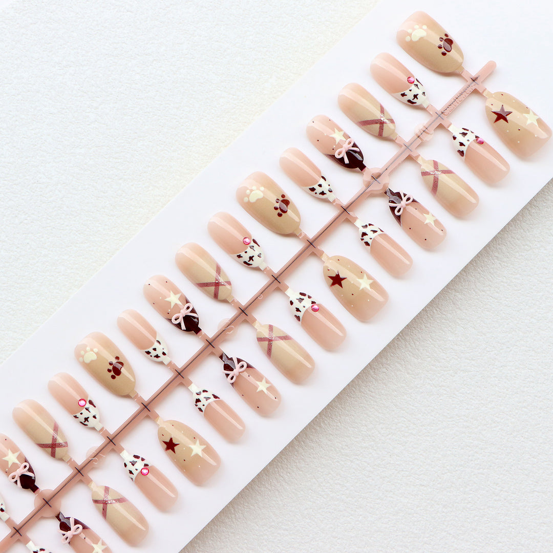 Thematic Press-On Nail Art Set with Charming Designs Stornfield