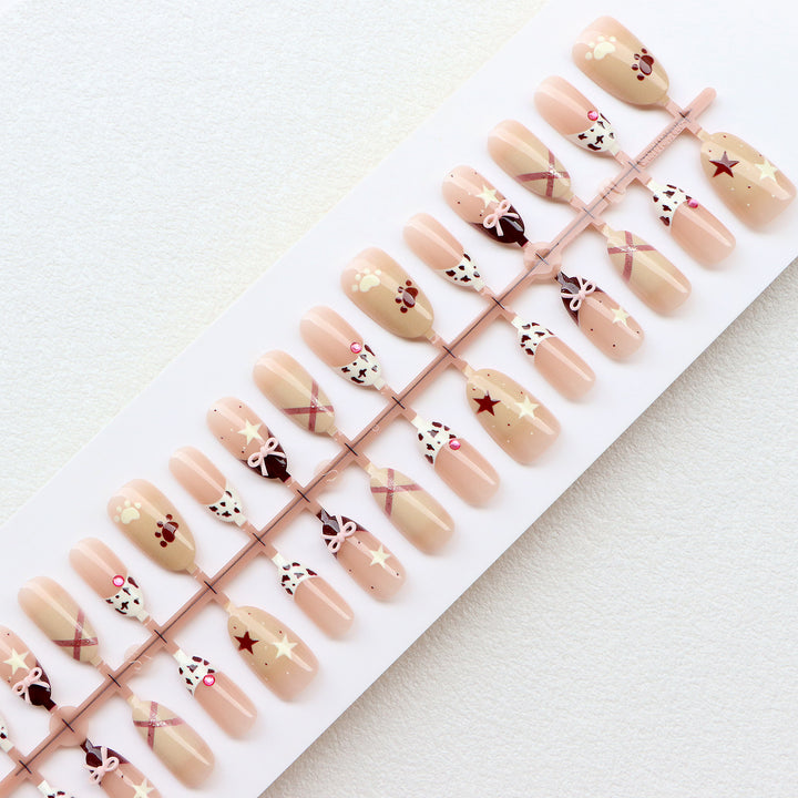 Thematic Press-On Nail Art Set with Charming Designs Stornfield