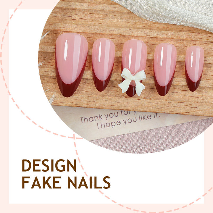 Acrylic nail set with creative French tip design and cute bows Stornfield