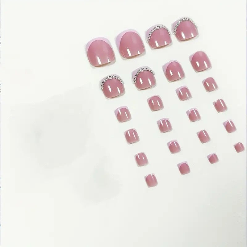 Nail art set with elegant design and glitter accents Stornfield