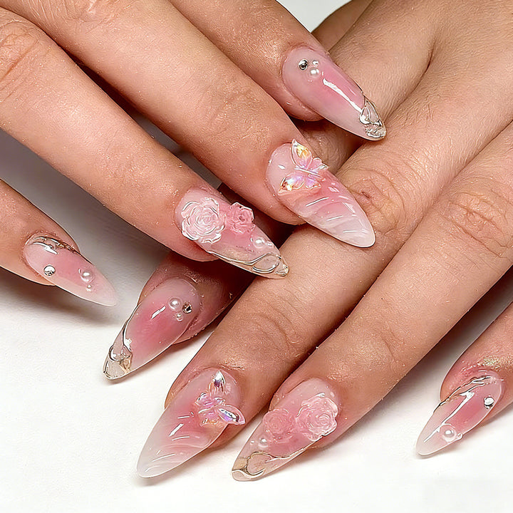Artificial nails with delicate rose design and glitter accents Stornfield