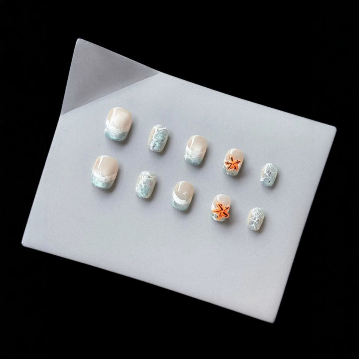 Elegant Press-On Nail Art Set with Ocean-Inspired Design