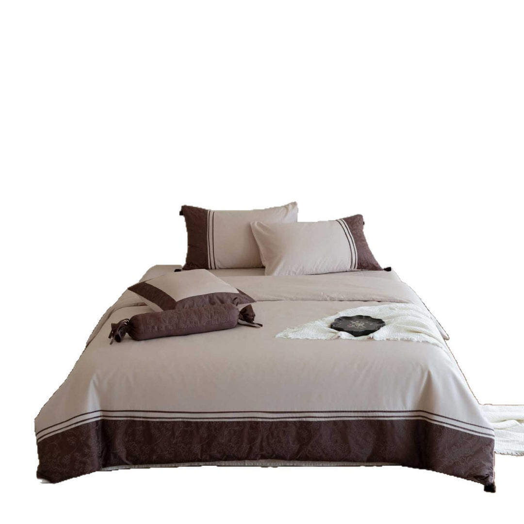 Bedding set made of cotton satin with decorative hem and decorative pillow