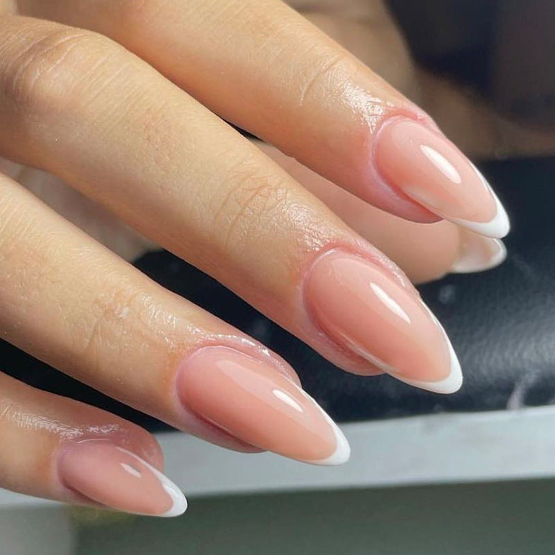 Artistic Nail Extensions in Elegant French Tip Design Stornfield