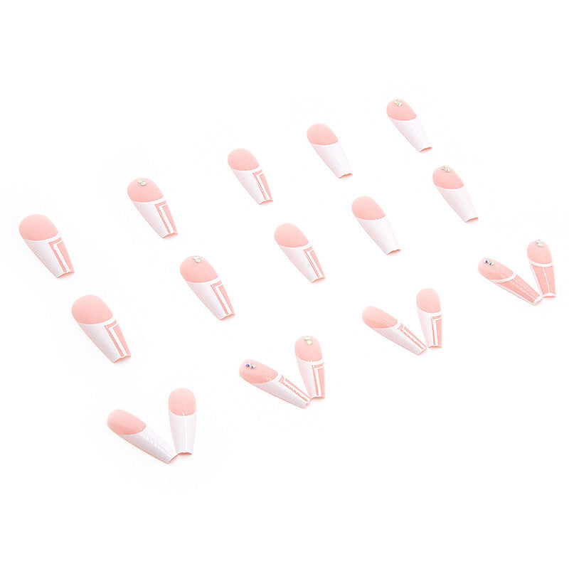 Artificial nails with elegant geometric designs and glossy finish Stornfield