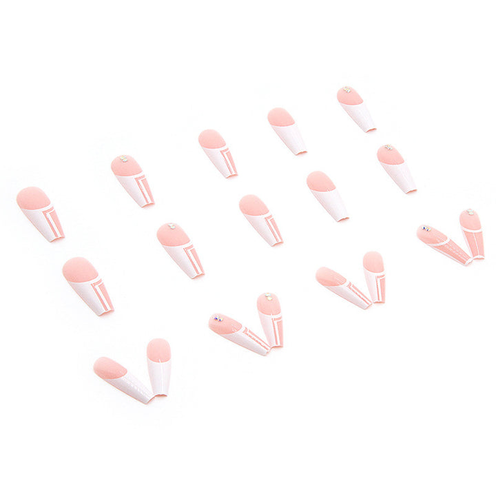 Artificial nails with elegant geometric designs and glossy finish Stornfield