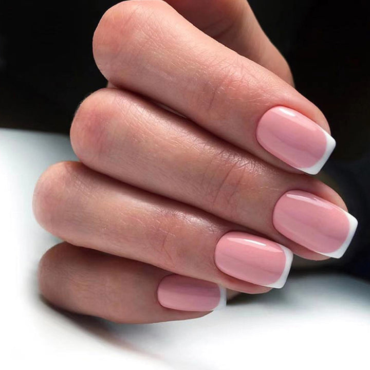 Artful nail extensions with classic French design Stornfield