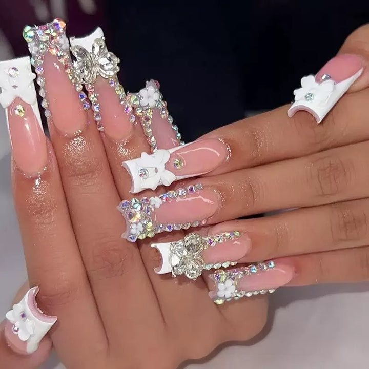 Artificial nail set with shimmering rhinestone decorations and floral design Stornfield