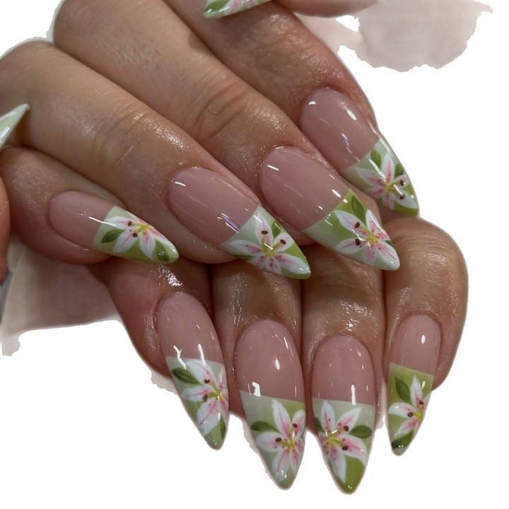 Artificial nails with hand-crafted floral embellishments Stornfield