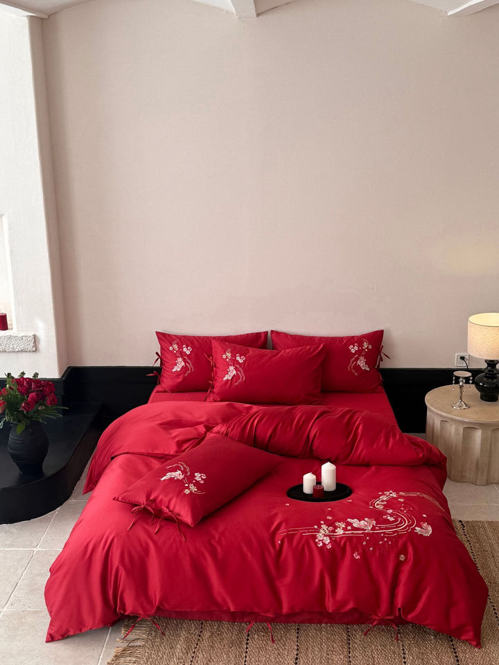 Embroidered satin bedding set with ribbon ties and delicate floral embroidery Stornfield