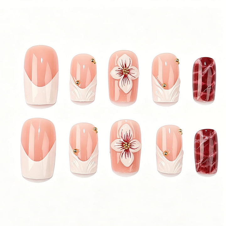 Artificial nail set with luxurious 3D flower accents and glitter details Stornfield