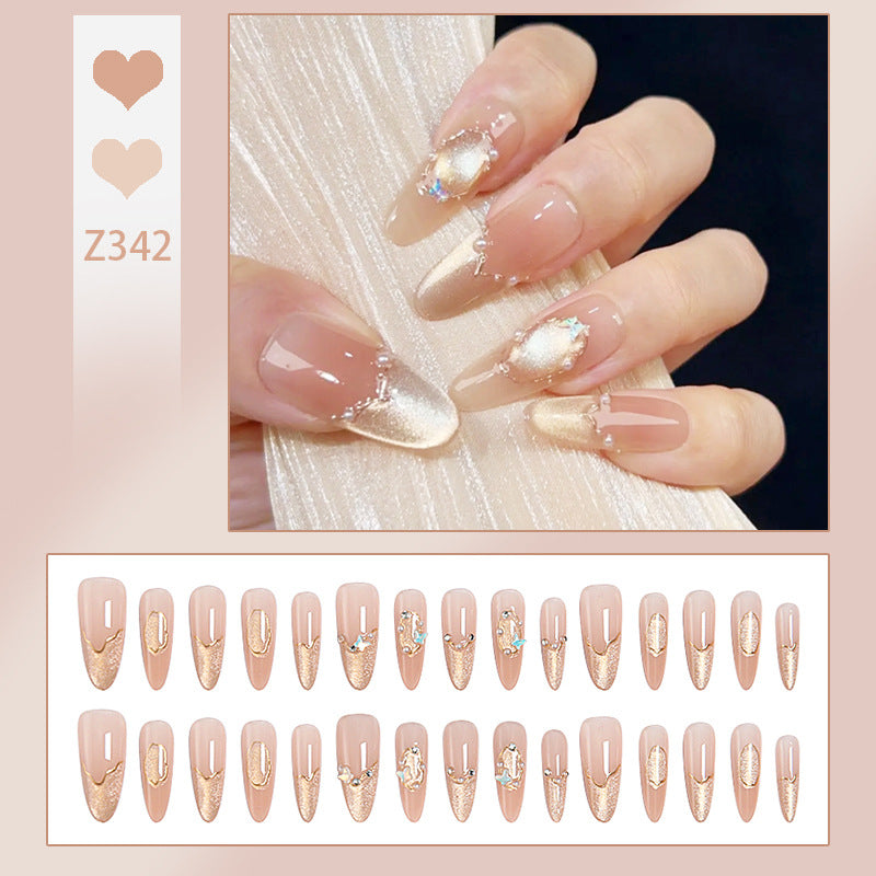 Art nail set with elegant gold glitter design Stornfield
