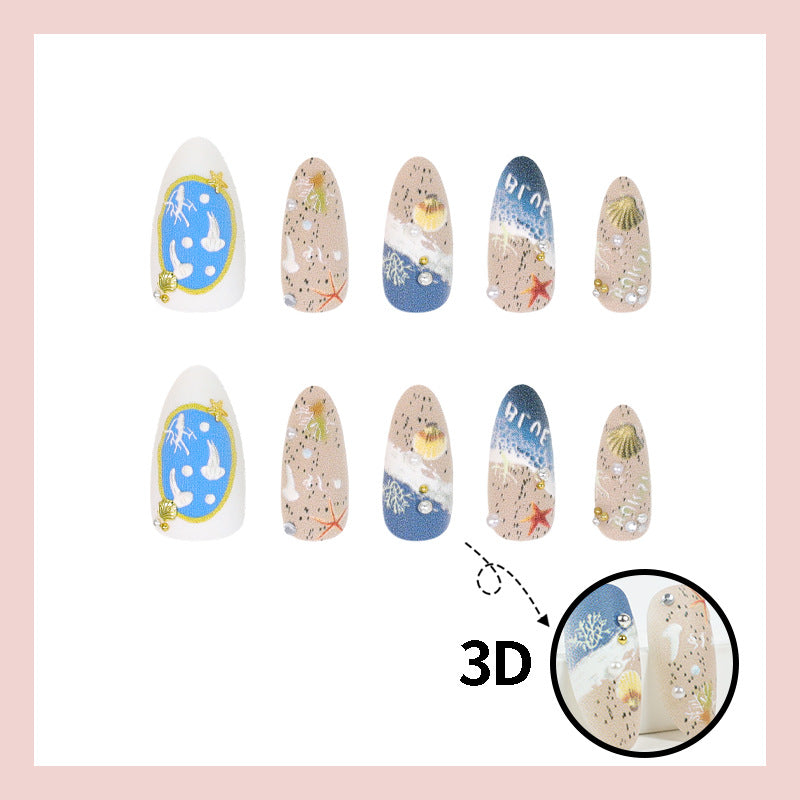 Artificial nail set with maritime designs and elegant embellishments Stornfield