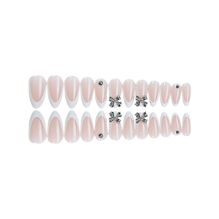 Glamorous artificial nails with sparkling 3D accents Stornfield