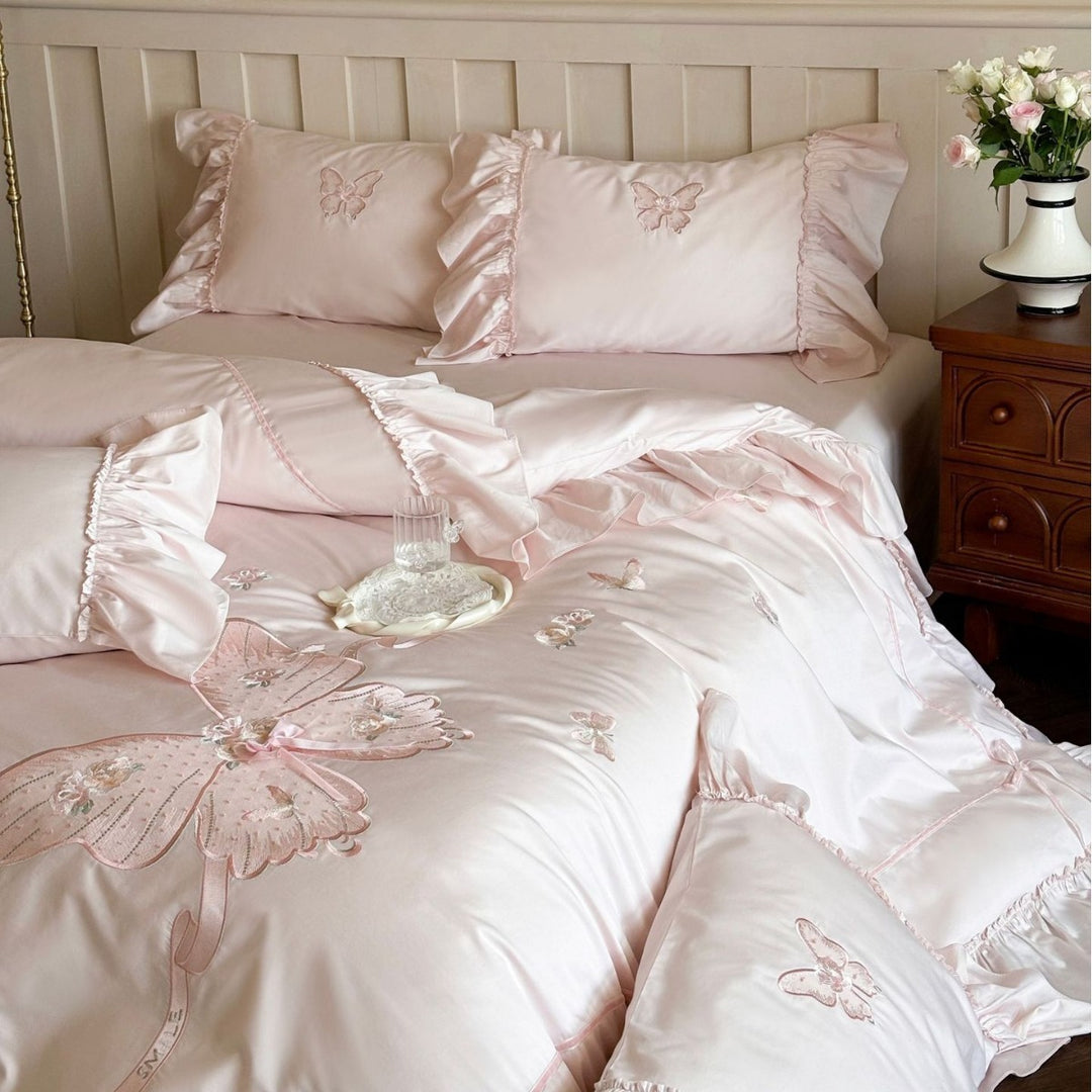 Romantic ruffled bedding set with butterfly embroidery and quilted comforter