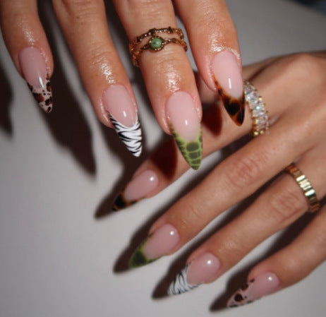 Glamorous artificial nail set with sparkling rhinestone embellishments and creative animal designs Stornfield