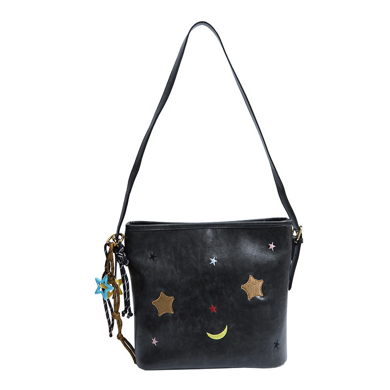 Shoulder bag with charming applications Stornfield