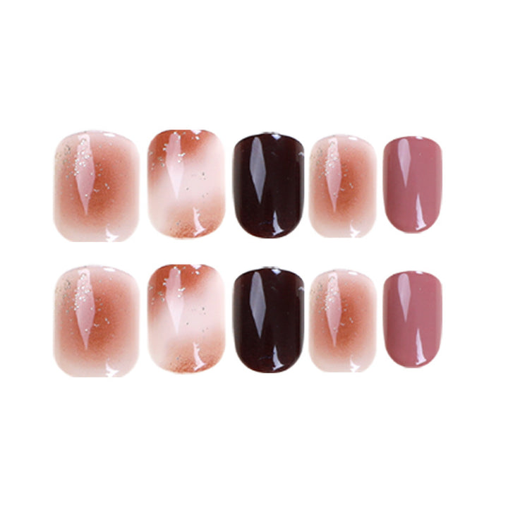 Elegant Nail Art with Glitter and Ombre Effect Stornfield