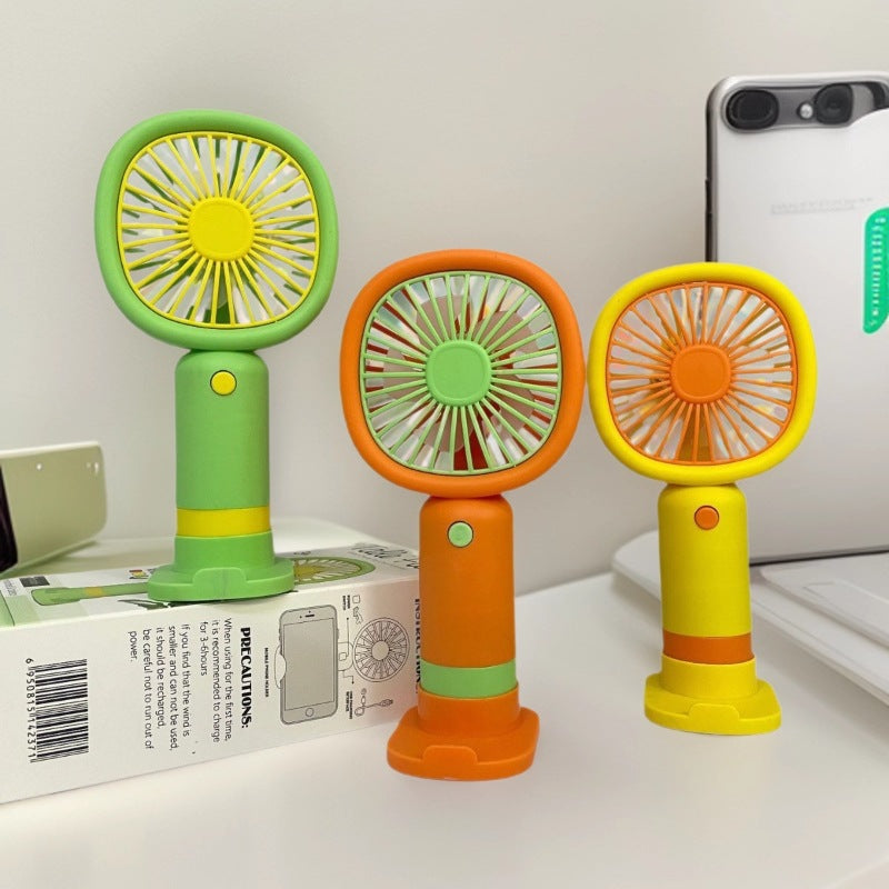 Unisex Handheld Fan with ergonomic design and practical stand function Stornfield