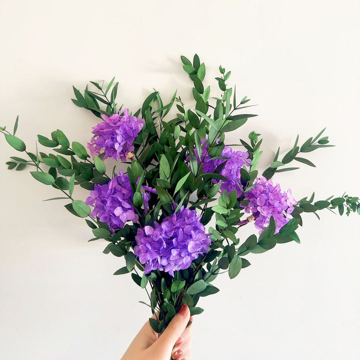 Lifelike Floral Bouquet with Green Foliage