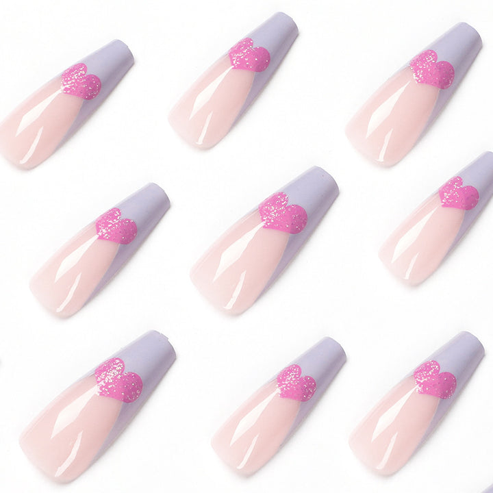 Artful stiletto nails with colorful heart designs Stornfield