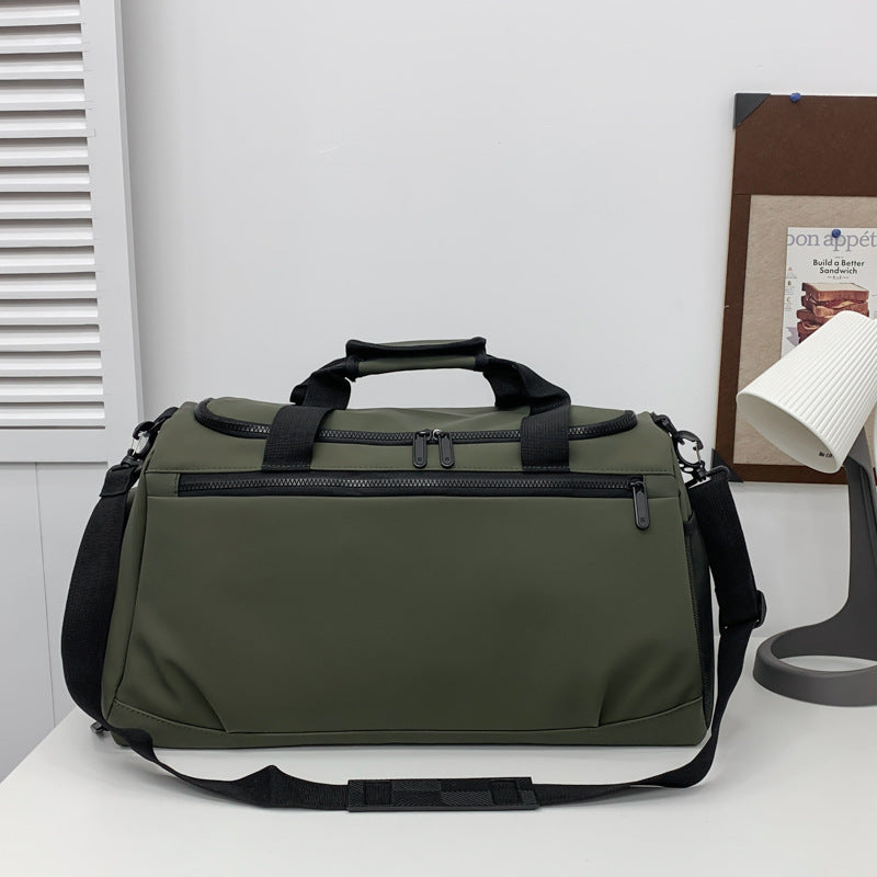 Sporty travel bag with reinforced carrying handles and multiple compartments Stornfield