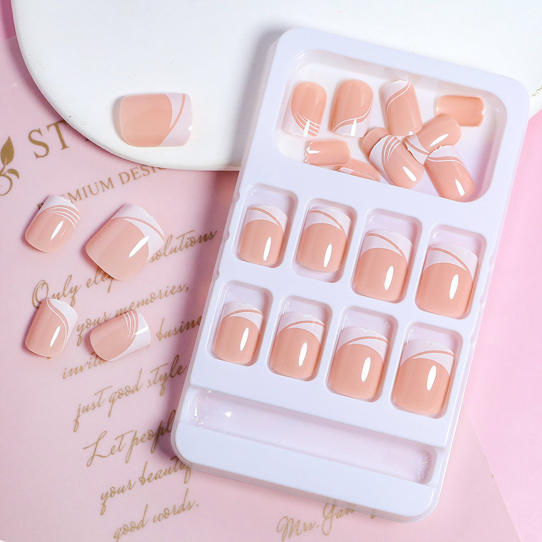 Artificial nail set with elegant French nail design and modern lines Stornfield