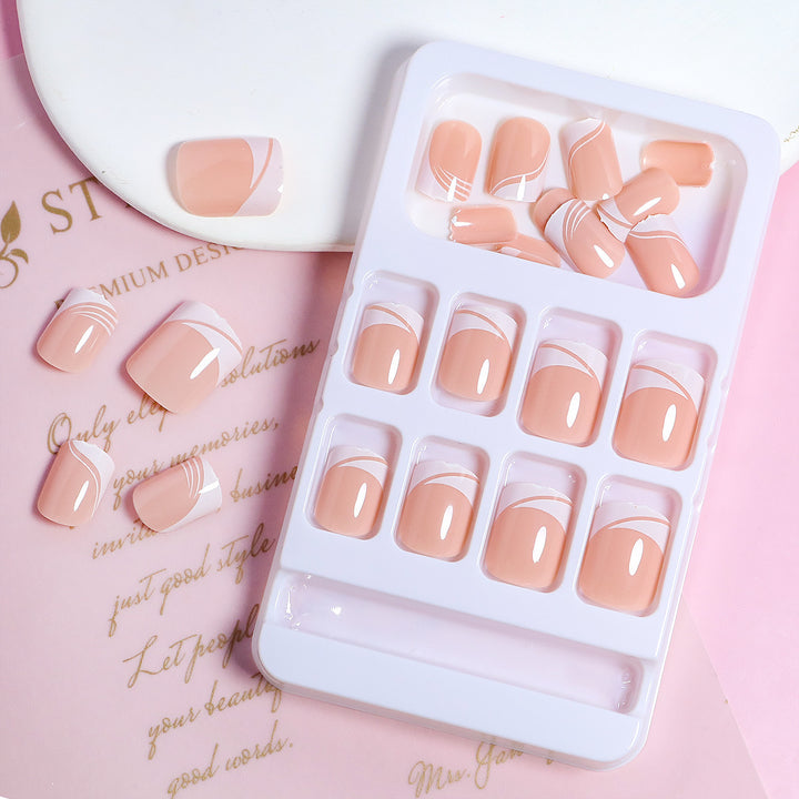 Artificial nail set with elegant French nail design and modern lines Stornfield