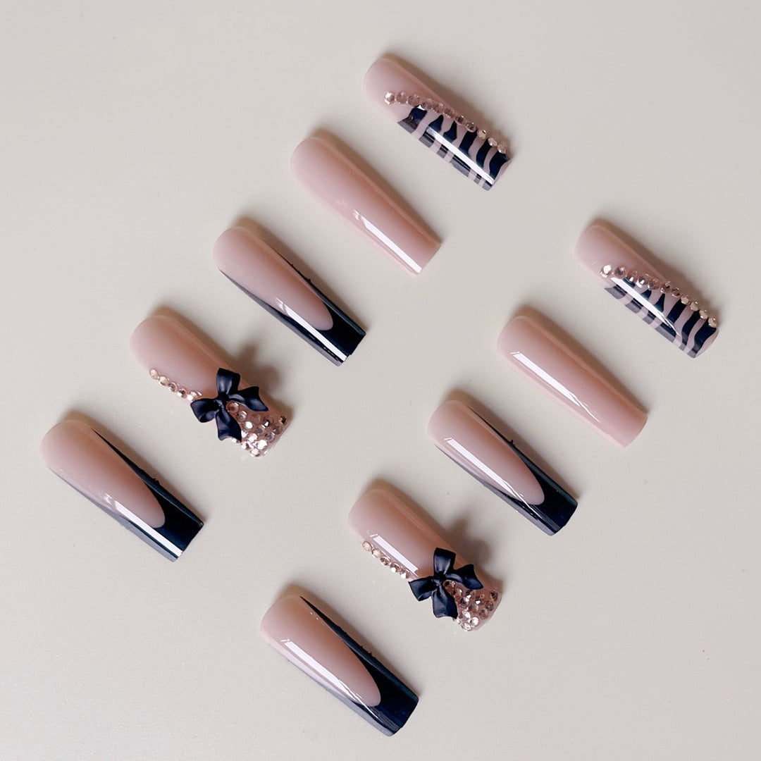Artificial nail set with elegant tips and glamorous accents Stornfield