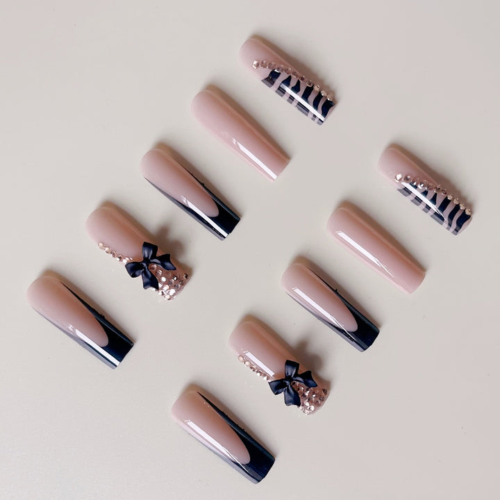 Artificial nail set with elegant tips and glamorous accents Stornfield