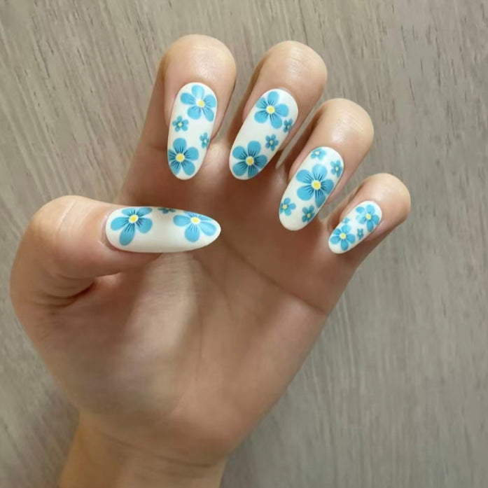 Artistic Almond-Shaped Press-On Nails Set with Metallic Accents Stornfield