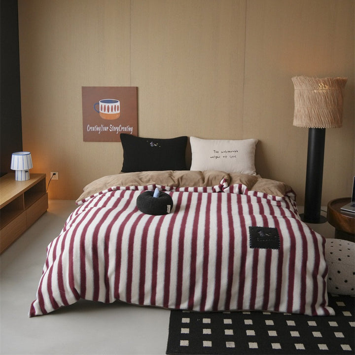 Fluffy reversible bedding set with polka dot design and plush applications