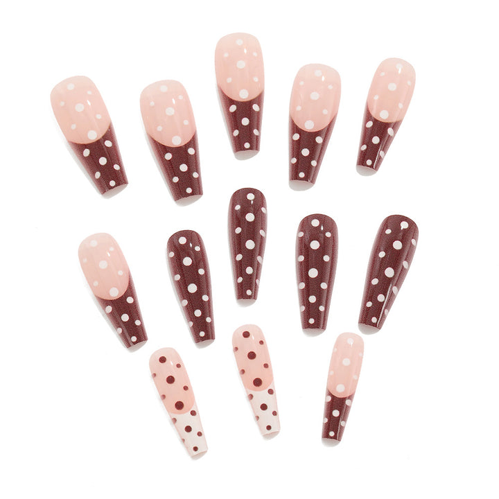 Artificial nails in the popular polka dot design Stornfield