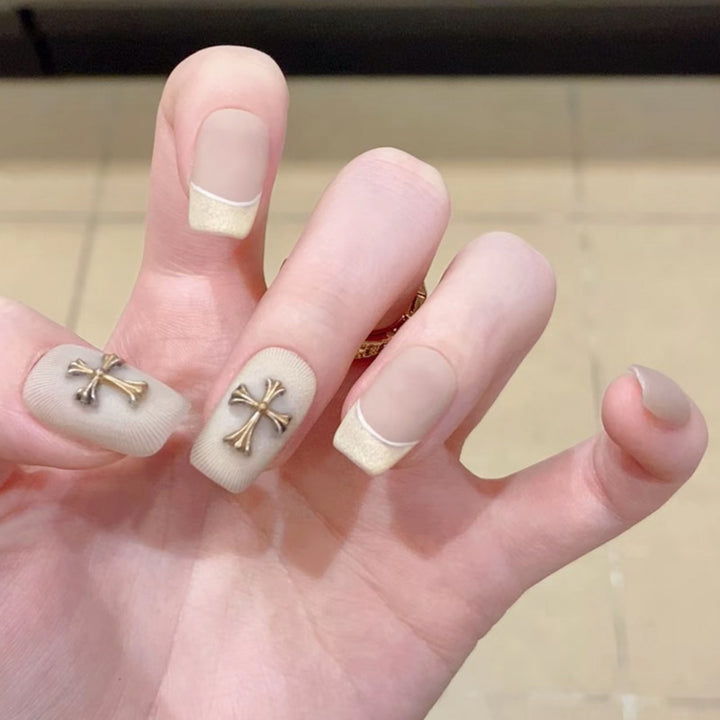 Glamorous artificial nails with creative embellishments Stornfield