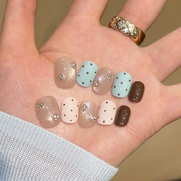 Acrylic nails with rhinestones and glitter Stornfield