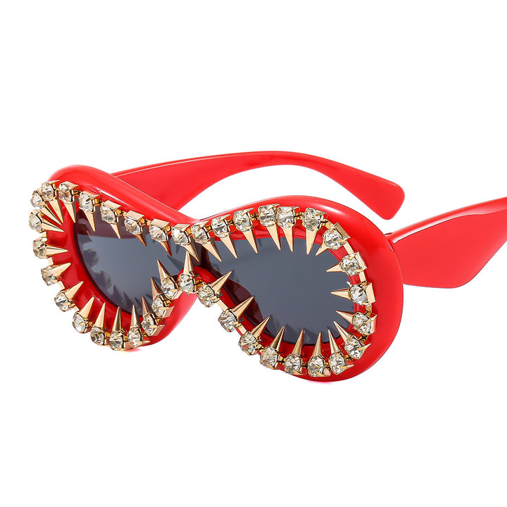Women's fashionable sunglasses with extravagant spikes and crystal embellishments Stornfield
