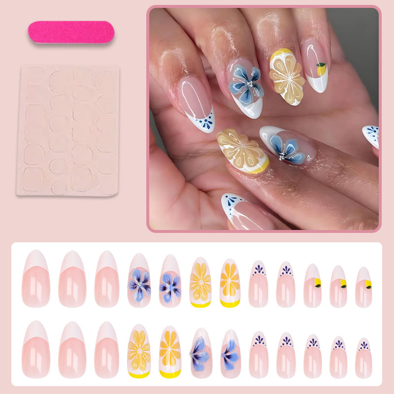 Nail art set with elegant floral and butterfly accents Stornfield