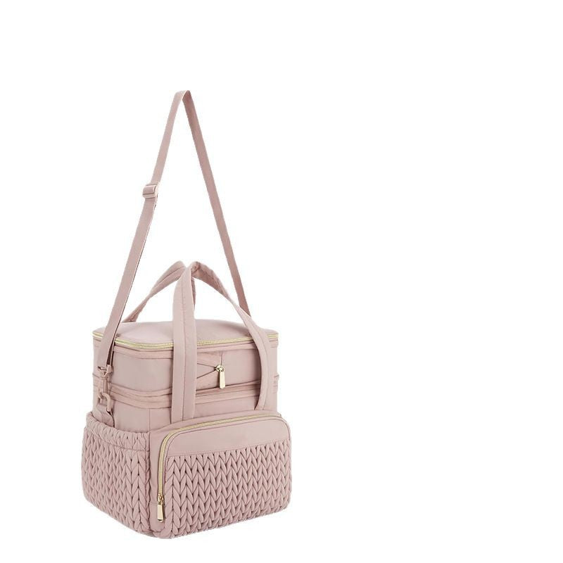 Insulated picnic bag with multi-layered interior compartment and practical carrying system Stornfield